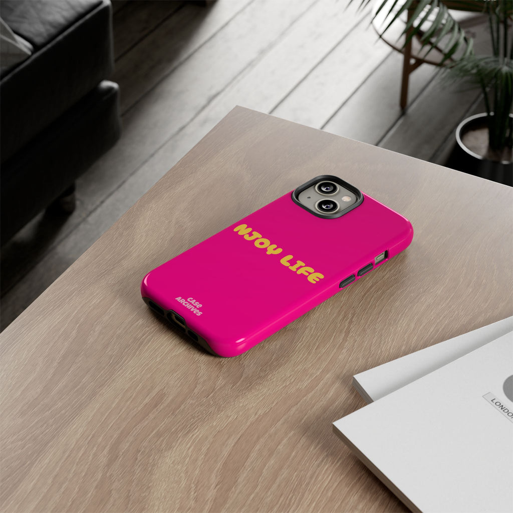 Enjoy Life phone case | tough iPhone case, bright pink, retro yellow text