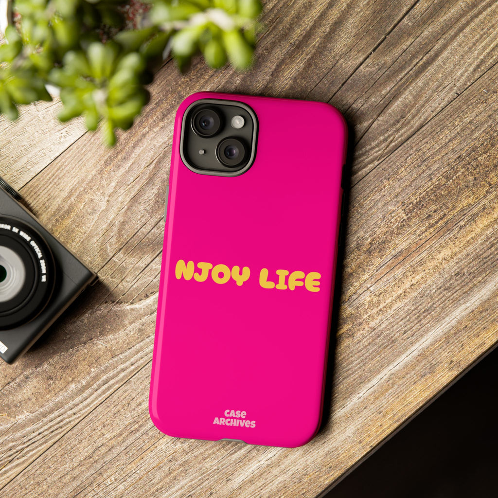 Enjoy Life phone case | tough iPhone case, bright pink, retro yellow text