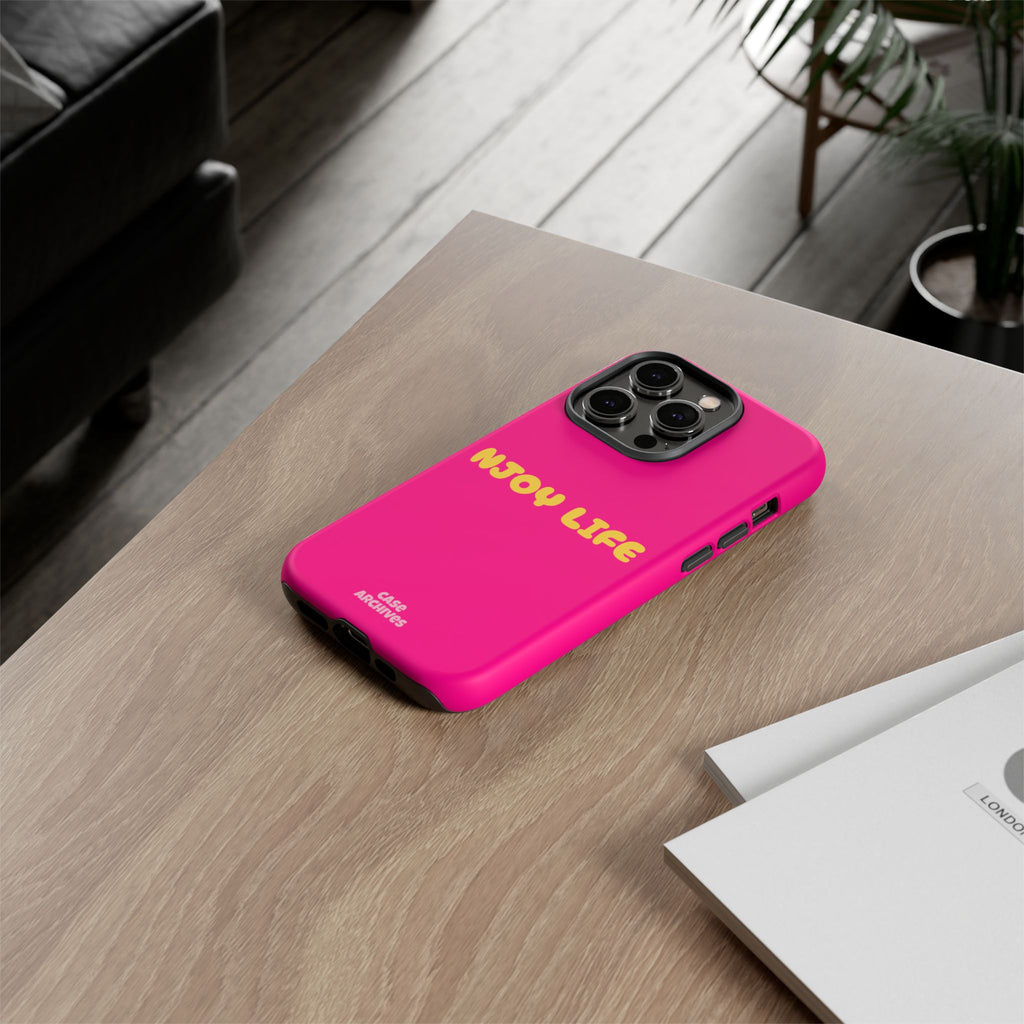 Enjoy Life phone case | tough iPhone case, bright pink, retro yellow text